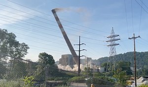 The smokestacks from the former Cheswick Generating Station fell Friday morning. | TribLive