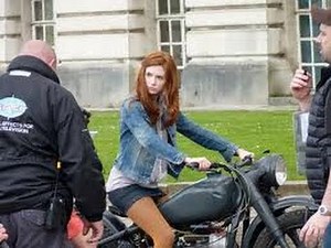Girl in Skirt Races Motorbike!
