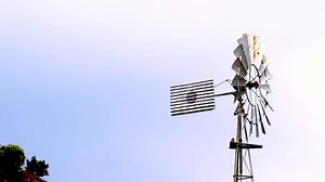Old Rusty Windmill Spinning Wind Pumping Stock Footage Video (100% Royalty-free) 3930817581 | Shutterstock