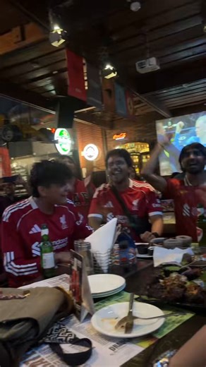 Just a bunch of guys in their twenties watching football over beers and having a good time. Whether that pub is in Liverpool or Lajpat Nagar, it doesn't matter. The replies are calling them coolies and sepoys for... watching a football match at a bar? Bhai log apna paisa kharch karke, apni shaam enjoy kar rahe hain.And some of these guys follow every fixture, know the squad deeper than half the locals at Anfield, and genuinely live and die with the results. Let them enjoy their evening, they're 
