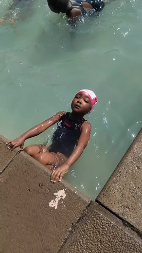 Swimming Fun with Mother and Daughter