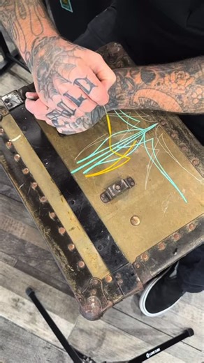 Ronan Paints on Instagram: "Good morning. Today we’re checking out a super cool paint job on this WW2 era footlocker, courtesy of Daytona’s @avellar_creative. Pinstriping, lettering and graphics done with Ronan’s One Stroke Lettering Enamels. #pinstriping #whiskyandwarstories #ronanpaints #onestrokeletteringenamel #coloryourworld #liveincolor #alwayshandpaint"