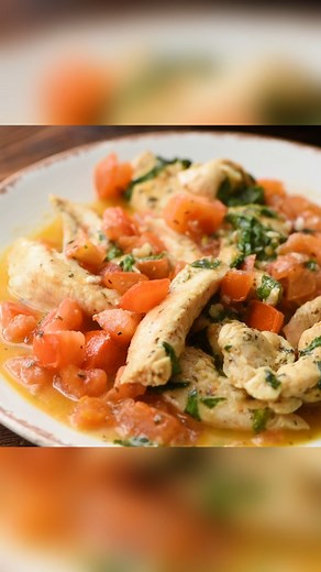 2.4K views · 427 reactions | Tomato Basil Chicken is a healthy, flavorful dish that is packed with juicy tomatoes, fresh basil, garlic, and topped with Parmesan! Recipe>> https://thecookinchicks.com/tomato-basil-chicken/ | The Cookin' Chicks | Facebook