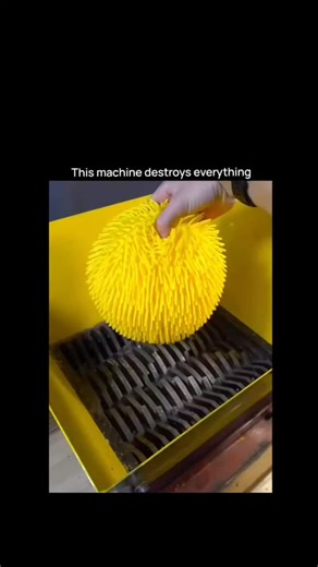 sci || tech || history on Instagram: "The post features a 22-second video of a yellow, googly-eyed shredding machine crushing everyday objects like scrubber sponges, balloons, masks, bubble wrap, and flip-flops, creating an "oddly satisfying" visual effect that aligns with popular ASMR destruction trends on social media. Posted on January 5, 2026, by Indonesian user @brain.shots.io , it rapidly gained 432 likes, 163 reposts, and over 221,000 views in under 24 hours, indicating strong appeal in s