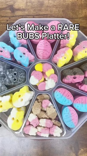 @poppincandyofficial on Instagram: "🍍💀Let’s make a RARE BUBS candy platter! Which flavour would you choose?!💀🍍 #instagood #viral #satisfying #asmr #explorepage #candies #funny #platter"