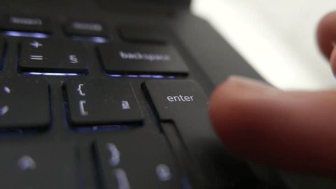 clip-4006998489-pov-someone-pressing-enter-key-non-stop-person