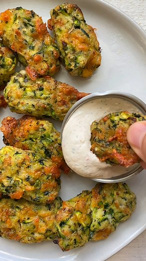 RECIPE: https://feelgoodfoodie.net/recipe/zucchini-tots/ These Zucchini Tater Tots are the perfect snack or appetizer to incorporate more veggies into your diet! | Feel Good Foodie