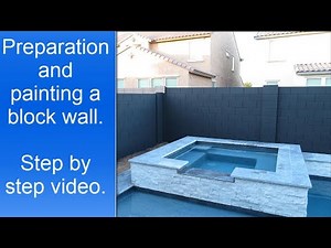 Painting a cinder block wall in Phoenix.