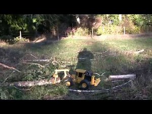 Hauling the skidder and yarding logs