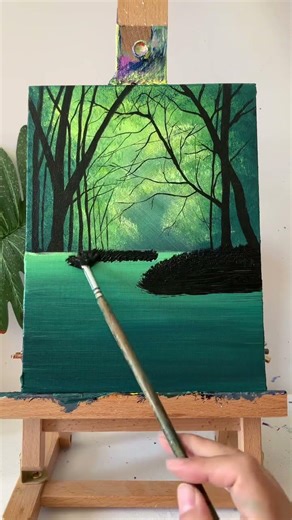 Green leaves falling with the wind over calm waters 🌿#NatureArt#greenscenery#