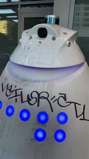 Robot Security Guard Gets Graffiti Makeover 🤖🎨