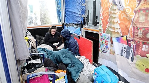 Inside the bus stop a homeless couple have converted in Selly Oak, Birmingham