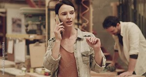 Woman, phone call and carpenter talking in a workshop for small business planning. Female person speaking on a smartphone for carpentry deal, marketing and ideas for creative furniture project