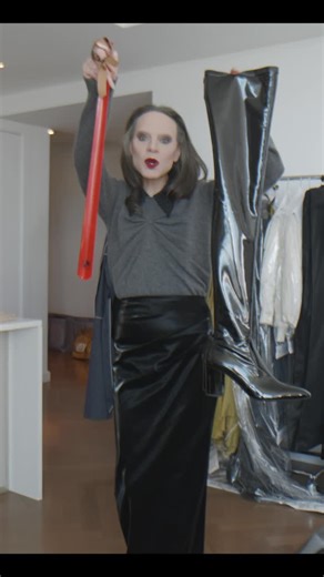 Jordan Roth on Instagram: "If these are your shoes, this is your shoe horn! Giving thigh high latex YSL for Kate Barton at New York Fashion Week. Video @jwvernon Styling @michael_philouze @albanrgr @tomkivell_stylist Face @silbruinsma1 Hair @brentlawler Nails @enamelle Sweater, Skirt, & Bag @katebarton Boots @ysl Glasses @celine"
