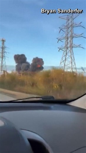 UPS plane explosion aftermath seen near site of crash