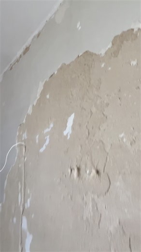How do you remove old plaster from a wall?