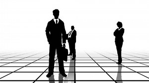 Computer generated animation of a black and white grid with business people silhouettes moving towards the camera. Seamlessly loopable animation.