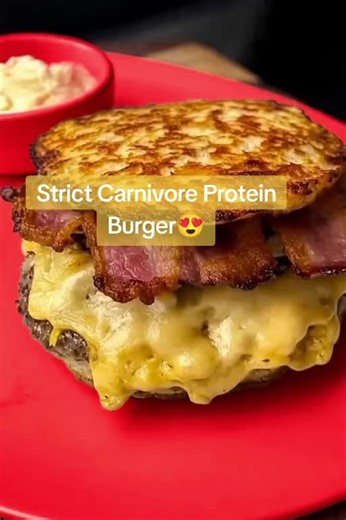 Strict Carnivore Protein Burger😍 🥩 Ingredients 7 oz ground beef (higher fat preferred) ½ chicken breast (minced / finely chopped) 1 large egg 2 oz cheddar cheese (optional if tolerated) Salt, to taste Butter or animal fat (for cooking) 1 slice bacon (optional but recommended) 🍳 Only animal-derived ingredients — zero plant foods. 👨‍🍳 Instructions 1) Make the “buns” Finely chop or grind the chicken breast. In a bowl, mix chicken, egg, salt, and cheddar cheese until well combined. Form into tw