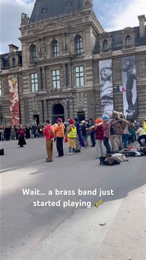 A brass band suddenly started playing at the Louvre in Paris 🎺