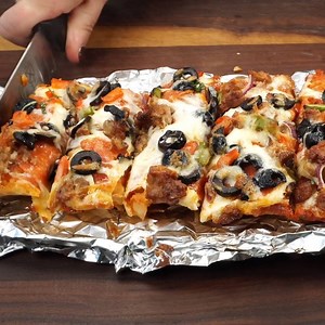 3M views · 199 reactions | Grilled French Bread Pizza is loaded with all your favorite toppings. An easy weeknight meal that everyone will devour! Plus you can make a bunch for the freezer! Recipe=>https://butteryourbiscuit.com/grilled-french-bread-pizza-supreme/ | Butter Your Biscuit | Facebook