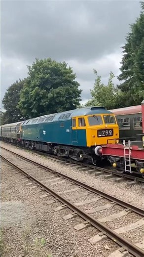 Steam train leaves Loughborough. Passing a class 47/20/D.M.U’s/crane etc