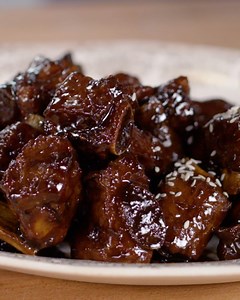2.9K views · 44 reactions | Kevin Pang and his father Jeffrey show you how to make crispy and sticky Chinese Spare Ribs. Watch on YouTube: https://bit.ly/3Q1EmKE | America's Test Kitchen | Facebook