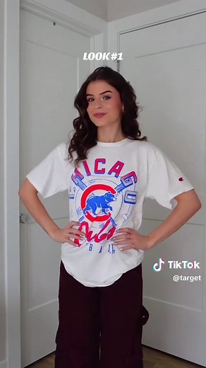 This is what stylish fan gear looks like ⚾️✨ @cassiana styles two Chicago looks that go from game day to every day with the new @Champion Official MLB collection. Shop now to rep your team in style, in store and online.