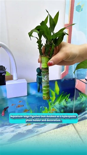 Aquarium-edge figurine that doubles as a hydroponic plant holder and decoration