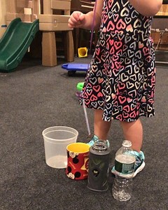 Today we practiced our visual-motor skills while learning about “wide” and “narrow”. . After tying a pencil to a string, she slowly lowered it into each size container from wider to narrower. This required real concentration and strength to control her whole arm from shoulder to fingers. . Great Job!!!!!👏👏👏👏👏👏👏👏 | Tots On Target