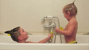 Two Children Enjoying Bath Time Together Stock Footage SBV-337476373 - Storyblocks