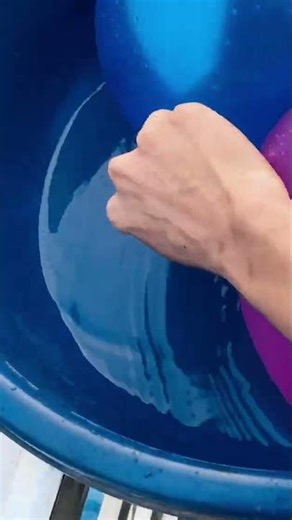 Experiment: Will a water balloon explode when it rolls down from a tall building? 💥🎈#baloon