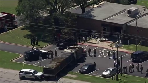 Suspect in custody after crashing semi-truck into Texas DPS office, killing one person