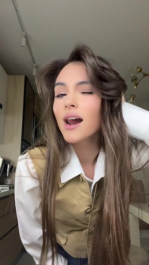 Home Dance Performance in Modern Kitchen Setting