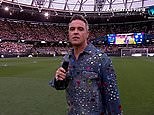 Robbie Williams performs hit song Angels at SoccerAid