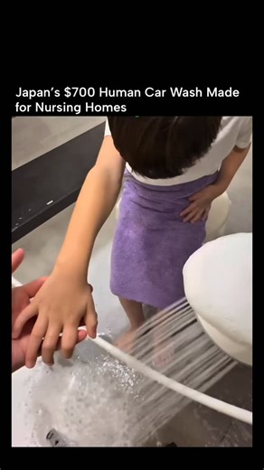 Resilience HQ on Instagram: "A “human car wash” that cleans you with spinning brushes and warm foam is going viral in Japan 🚿🤖 But this unusual device actually started as a serious medical-care invention. Originally designed for Japanese nursing homes, the automated foam-wash machine was created to help elderly and mobility-limited patients bathe safely without strain. Instead of manual scrubbing, the machine uses soft rotating brushes, warm bubbles, and adjustable nozzles to clean the body ge
