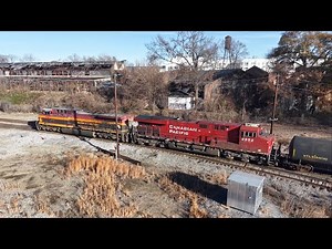 Two Morning NS Stack Trains at Howell Wye and Two CSX Freights with CP and KCS Power