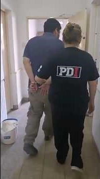 A suspect was handcuffed and arrested by policewoman.