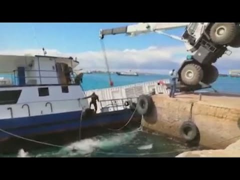 Watch the moment a diesel barge tips over and sinks in the Galapagos