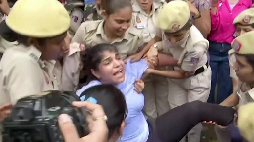 Indian police drag away and detain protesting wrestlers
