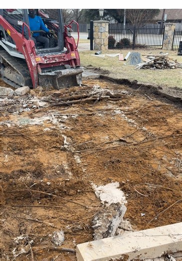 Using our slab eater concrete bucket to remove this damaged driveway than using it to break up and remove the tree roots that caused the damage
