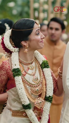 GRTJewellers on Instagram: "He wonders if marriage will change the bond they share. But her reassuring smile says it all—seasons may change, but a true friend remains by your side through it all. Some connections are simply too strong to be rewritten by distance or time. Let GRT Jewellers add a touch of permanence to your most cherished relationships. Explore The GRT Bridal Collections at the nearest GRT Jewellers Showroom. [The GRT Promise, GRT Brides, Unforgettable Weddings, Weddings, South In