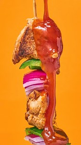 Pour on the Mambo sauce! 🌶️🤤 This sweet and spicy sauce made with a hint of tamarind is the perfect wingman for any dish, especially this mouth-watering chicken skewer with roasted veggies. 🍗🥕 So, stop drooling and start pouring! #swissfoodscaribbean #swissmambo #letsmambo #swisscaribbean | Swiss Foods