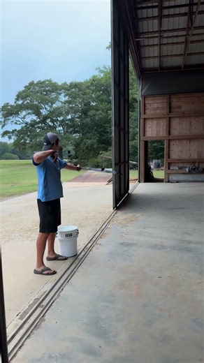 Curving an arrow in an out barn doors #archery #trickshot