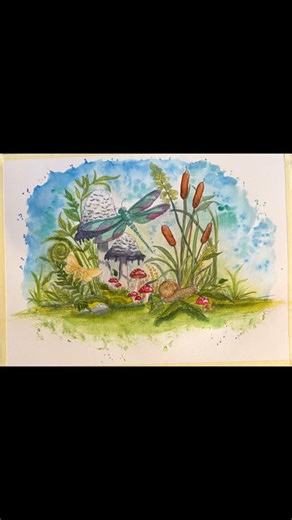 This piece feels like stepping into a tiny, secret world 💚✨ A quiet little ecosystem where dragonflies hover, mushrooms gather in clusters, and everything feels alive and connected. I loved layering the watercolor washes to keep it soft and dreamy, then adding ink details to bring out all the woodland textures—fern curls, cattails, snail shells, and those magical red mushrooms peeking through the grass. It’s a reminder to slow down and notice the beauty in the small, often-overlooked moments of