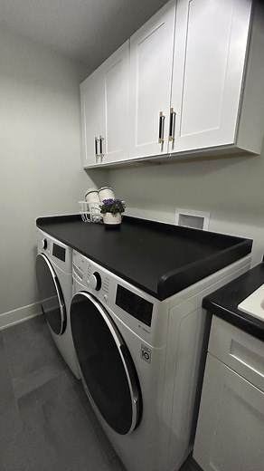 Home finds and DIYs - Emilie on Instagram: "Amazon laundry 🧺 find! Comment “topper” for the link. Be sure to follow to receive the link or it is in my amazon store. #ad This countertop from @kaboondesk was so easy to put together. It makes your washer and dryer so much more usable so you can fold laundry and not lose those socks behind it. #laundryroomhack #laundryroommakeover #laundryroomcountertop"