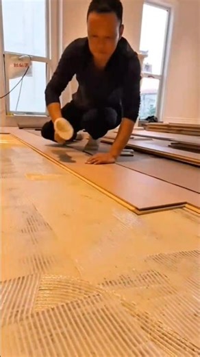 Installation of sheet vinyl flooring using adhesive and precision parallel stacking techniques