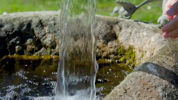 Slow motion footage of human hands refreshing or washing in fresh spring water under flowing stream of a clear natural water source with splashing droplets, refreshing outdoor nature footage Stock Video Footage - Alamy