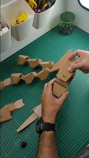 Innovative hinge for mechanical robot hand craft. Made out of cardboard.
