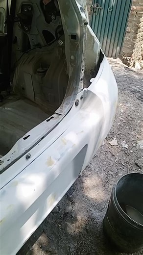 Disassembled Car Parts: A Close-Up View of Damage