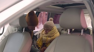 Free stock video - Girl sitting in the back seat of a car